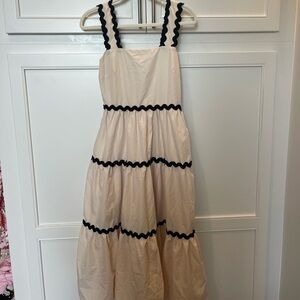 Elegant Cream Maxi Dress with Black Accents